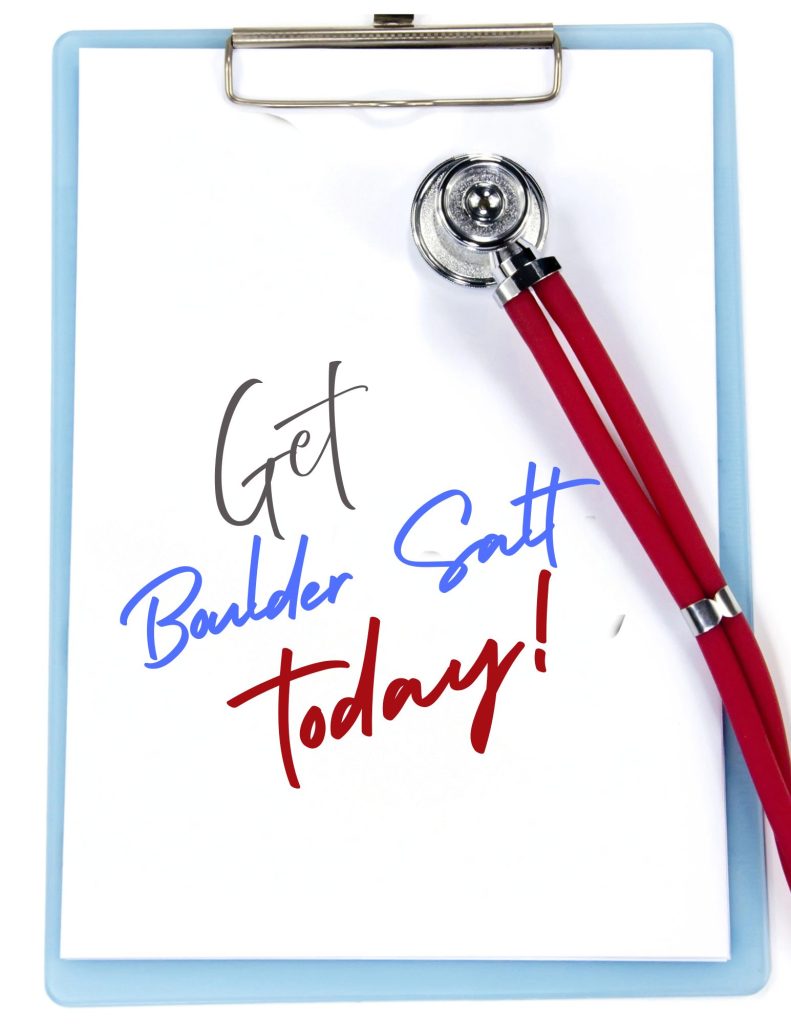 A medical clipboard with a red stethoscope and the words 'Get Boulder Salt today!' written on the page, highlighting the health-first recommendation for using a low sodium salt, that also has a full electrolyte profile