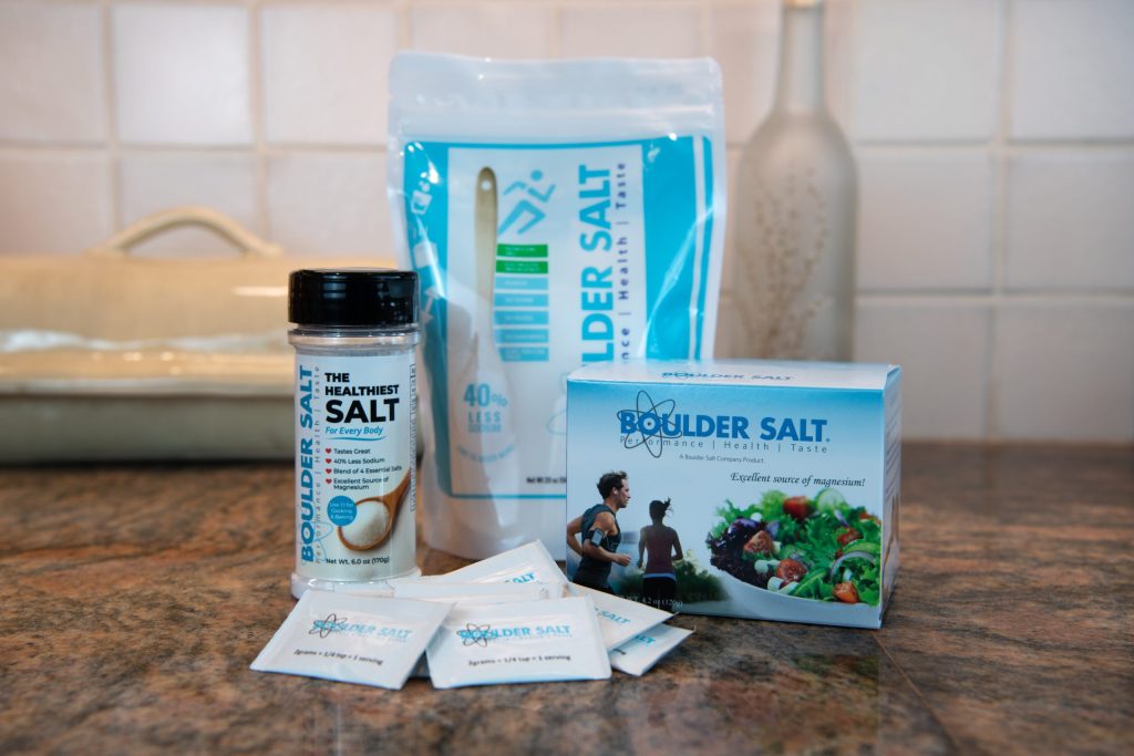 A Boulder Salt combo deal featuring a 20 oz resealable bag, a 6 oz shaker, and a box of 60 travel packets for convenient, low-sodium mineral support